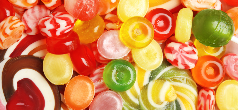 DifferentDeliciousColorfulCandiesAsBackgroundTopViewBannerDesign - welltica.dk - Vejen til et bedre liv