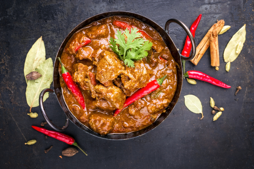 TraditionalIndianCurryLambMasalaAsClose-upInAKorai - welltica.dk - Vejen til et bedre liv